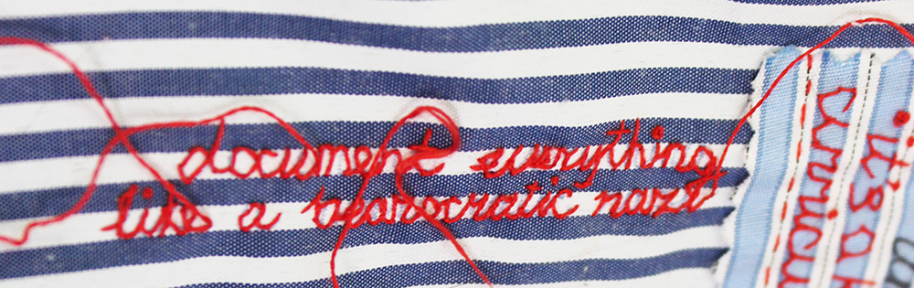 embroidery project by Tatiana Zakharova-Goodman; a shirt which includes embroidered notes from 2026 CSSE (Canadian Society for the Study of Education) Conference; detail